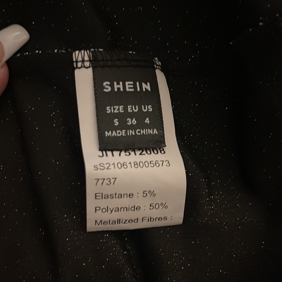 Mid length stretch black shimmery prom dress with slit in back size 4 never worn - Picture 5 of 5